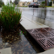 Rainwater flowing into a storm drain in Los Angeles