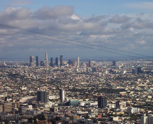 Downtown LA aerial view with power lines in foreground