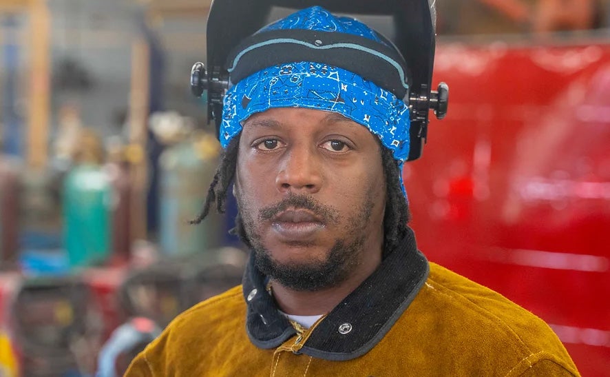 Josh Asberrey in welding gear