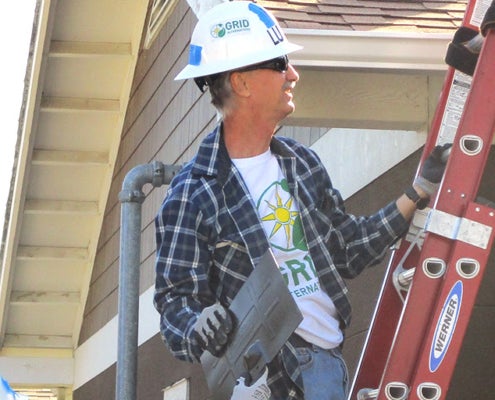 Luther Mays working at an installation project job site in Fresno.